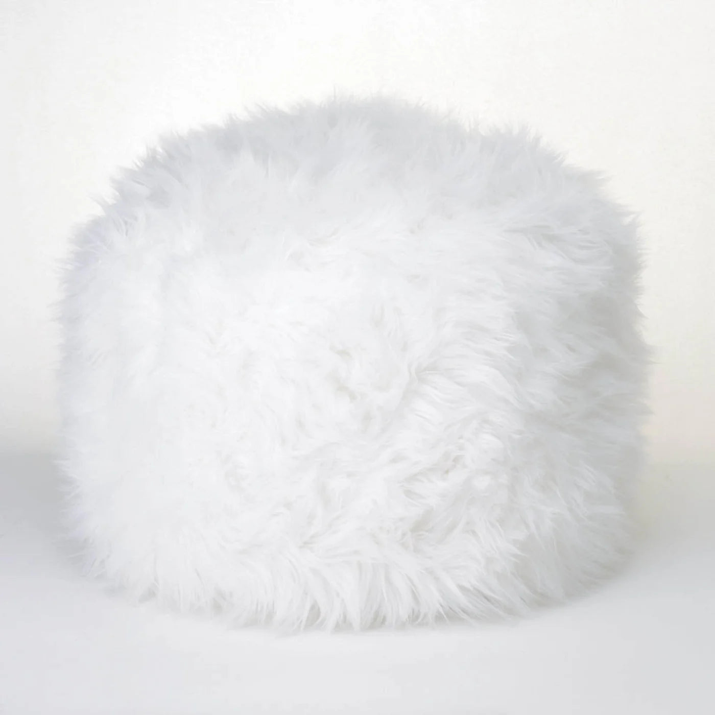 FUZZY WHITE OTTOMAN POUF